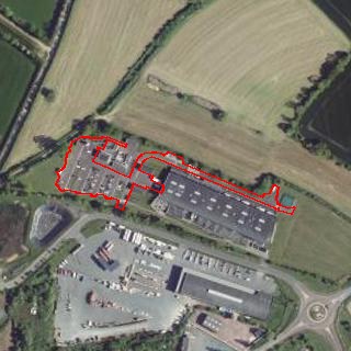 Vue aérienne du parking de France Croco à Périers